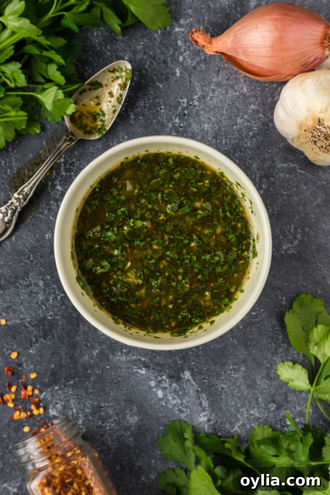 Bowl of vibrant green homemade chimichurri sauce