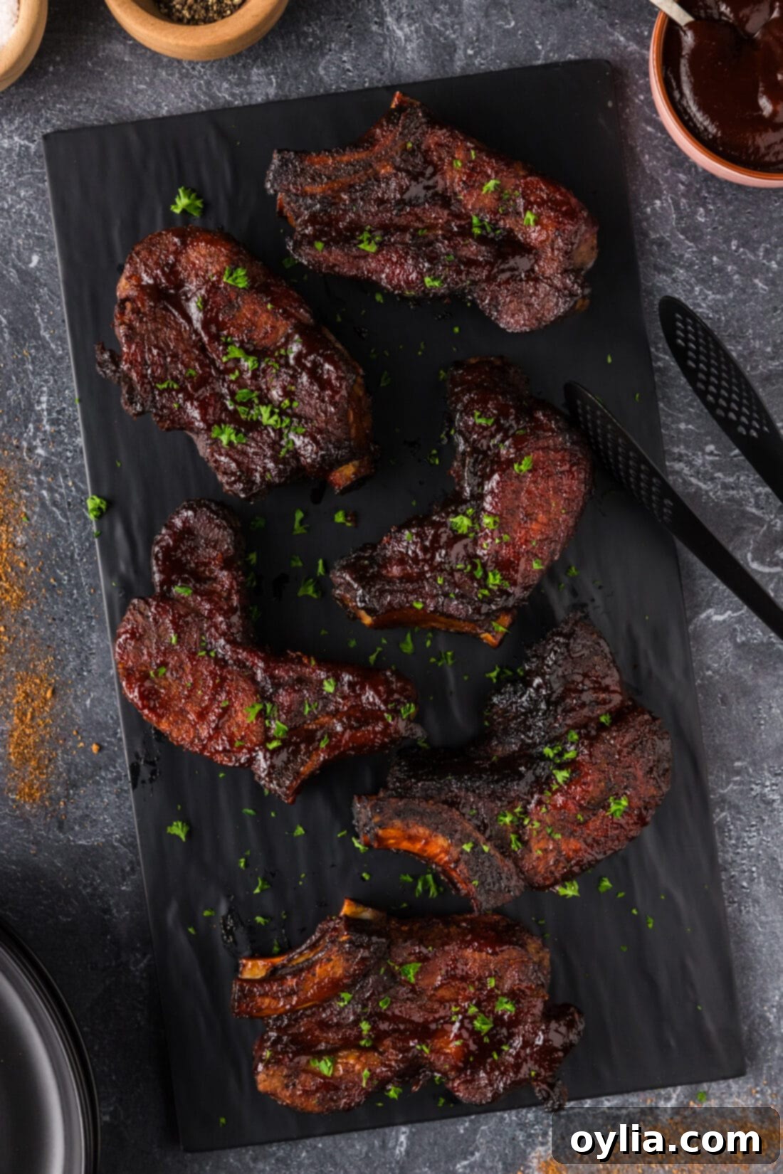 Country Style Ribs on a black platter 