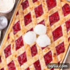 Cherry Slab Pie topped with three scoops of ice cream