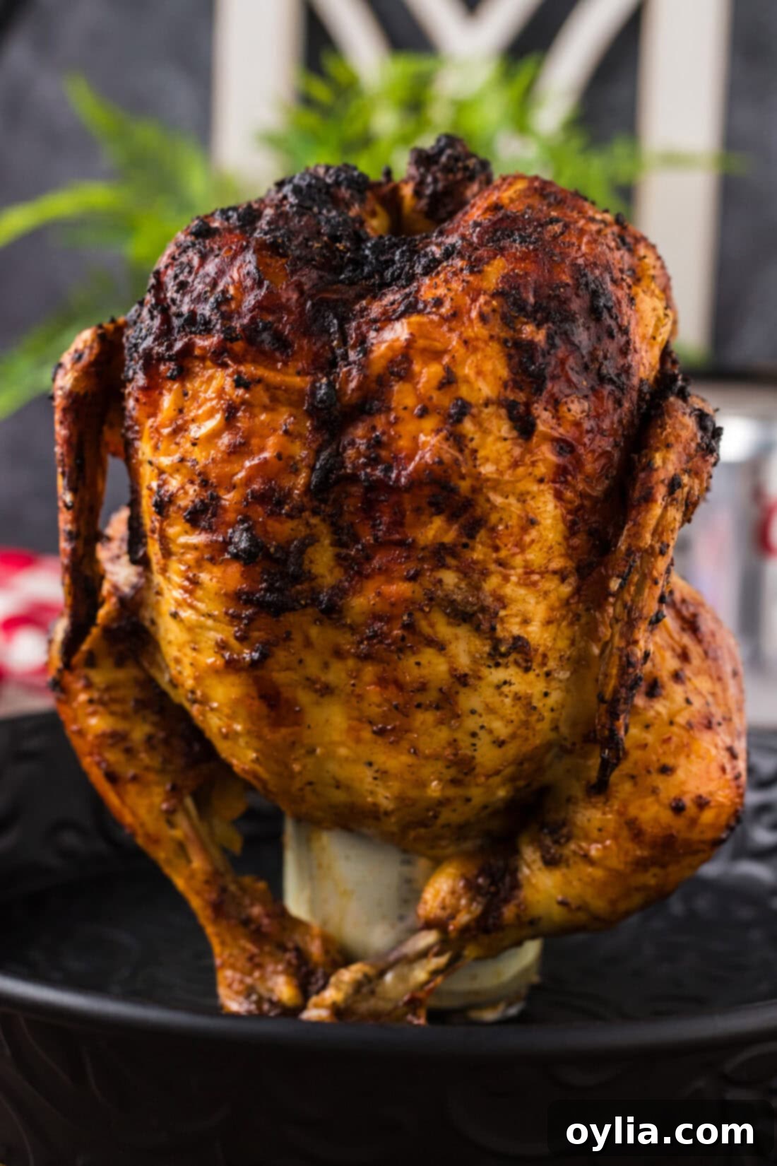Close up image of a Beer Can Chicken on a metal tray