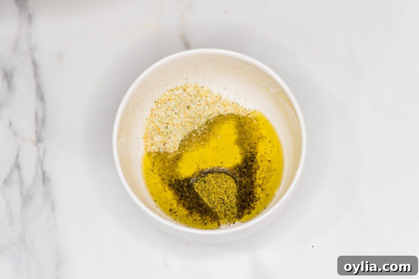 oliev oil and seasonins in a bowl