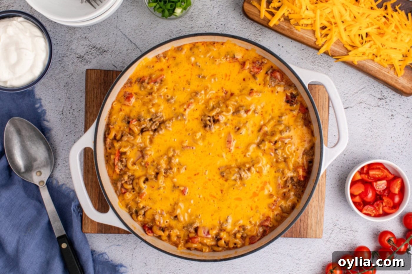 overhead shot of taco mac in a skillet covered with cheese