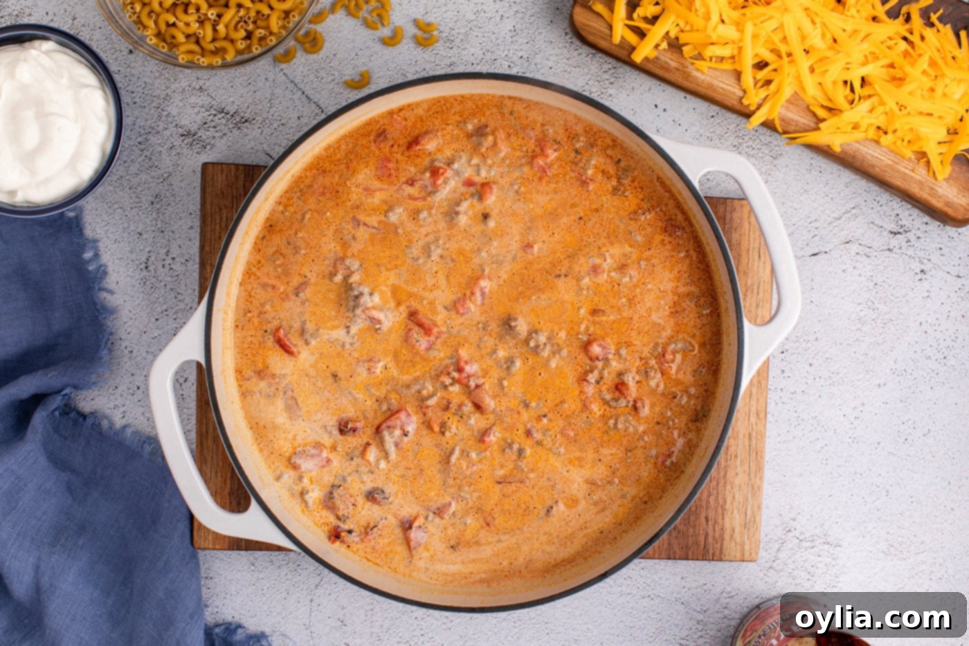 taco macaroni and cheese bubbling in a skillet