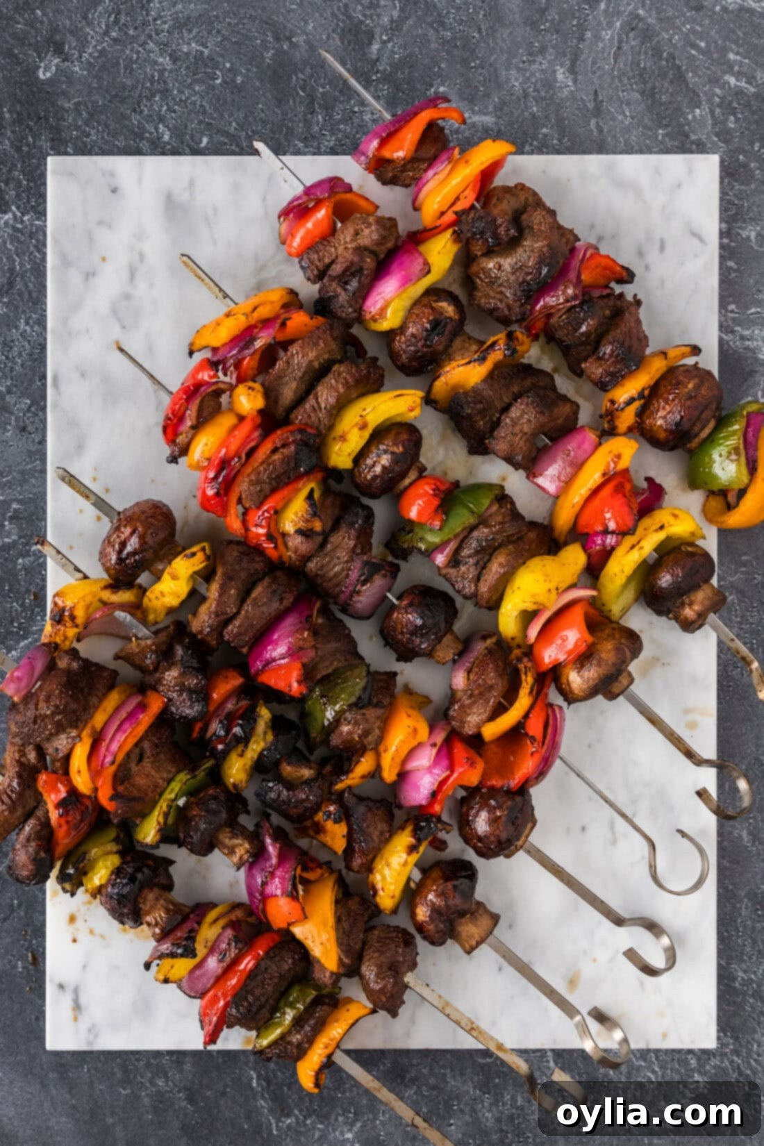 Ultimate Steak Kabobs 11 Steak Kabobs on a marble platter
