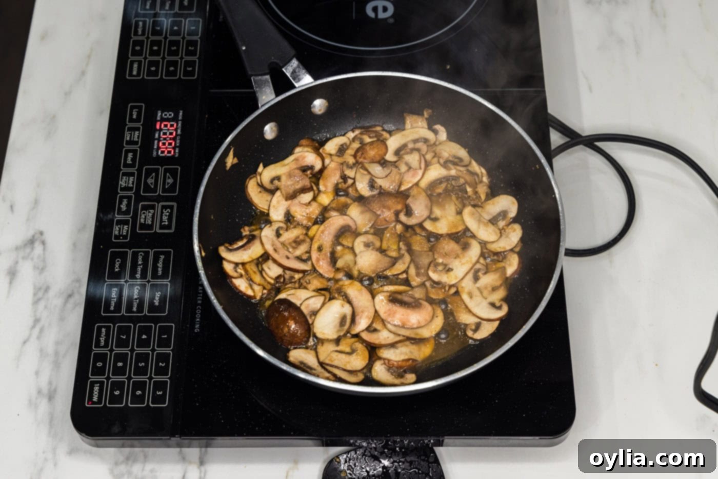 sauteed mushrooms in a skillet