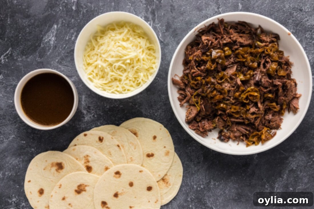 Tender Mississippi Pot Roast Tacos 4 Key ingredients for making Mississippi Pot Roast Tacos laid out on a rustic table