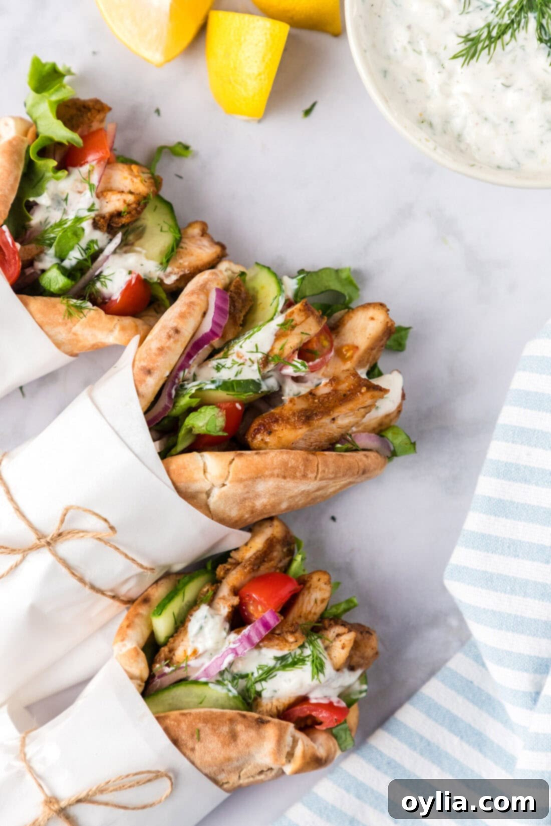 Homemade Chicken Shawarma 3 Chicken Shawarma in pita bread with veggies and tzatziki