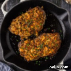 Blue Cheese Crowned Steak 13 Two Blue Cheese Crusted Steaks in a skillet