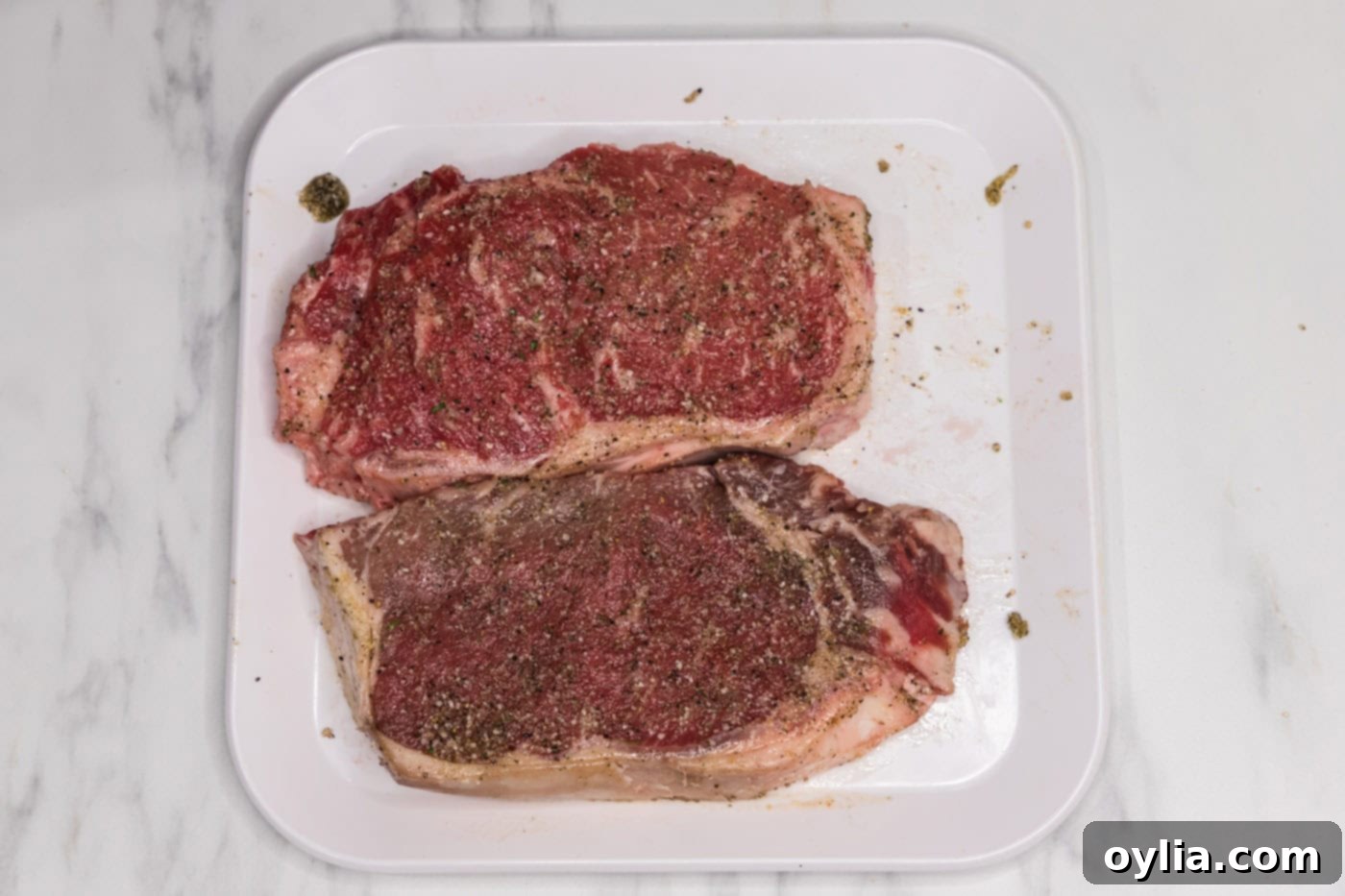 olive oil mixture rubber over steak