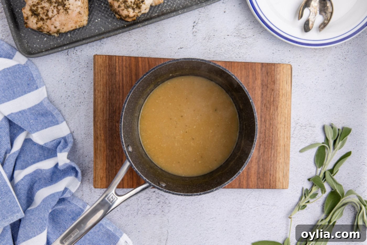 overhead of turkey gravy in a saucepan