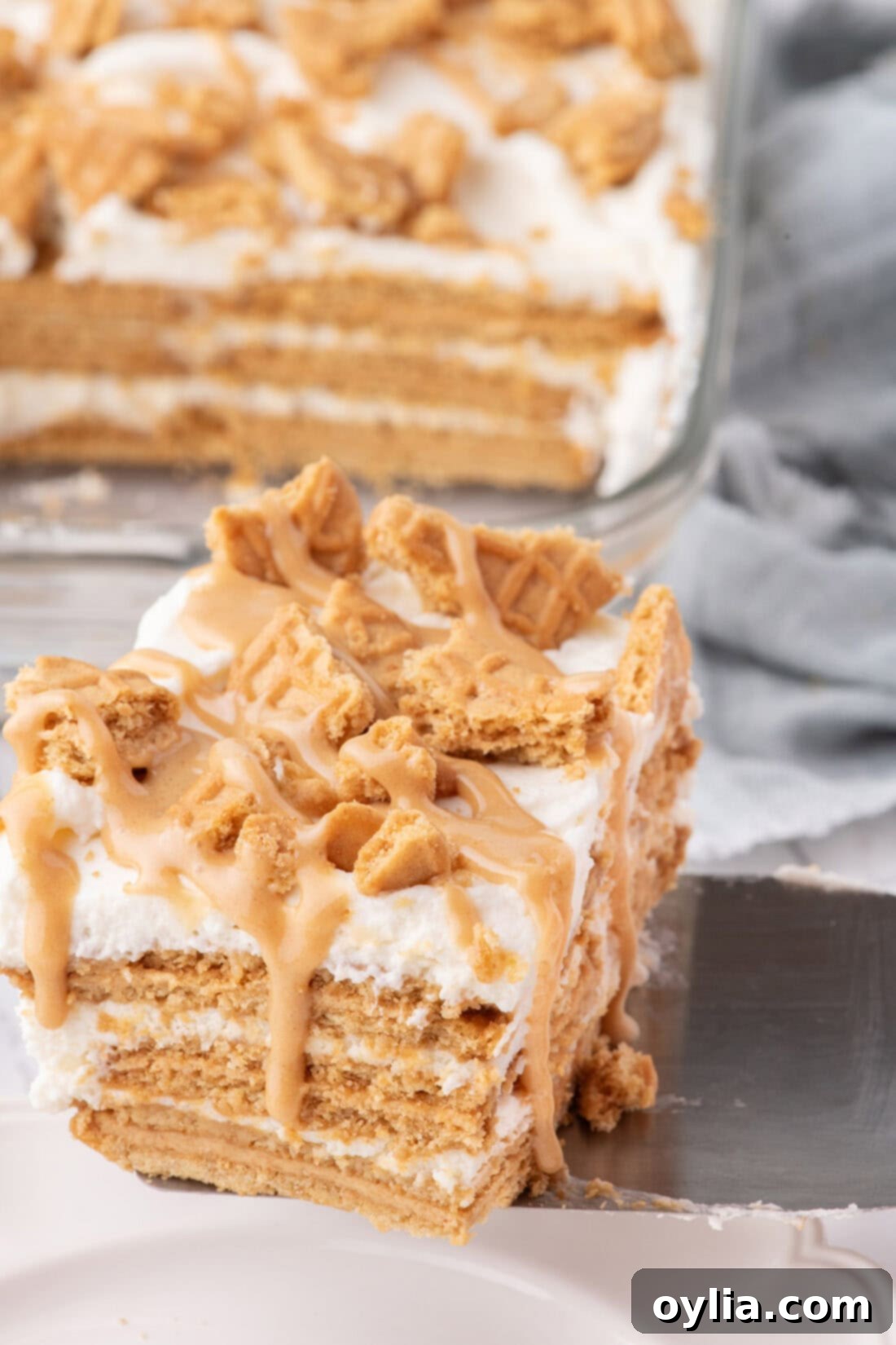 Slice of Nutter Butter Icebox Cake on a spatula