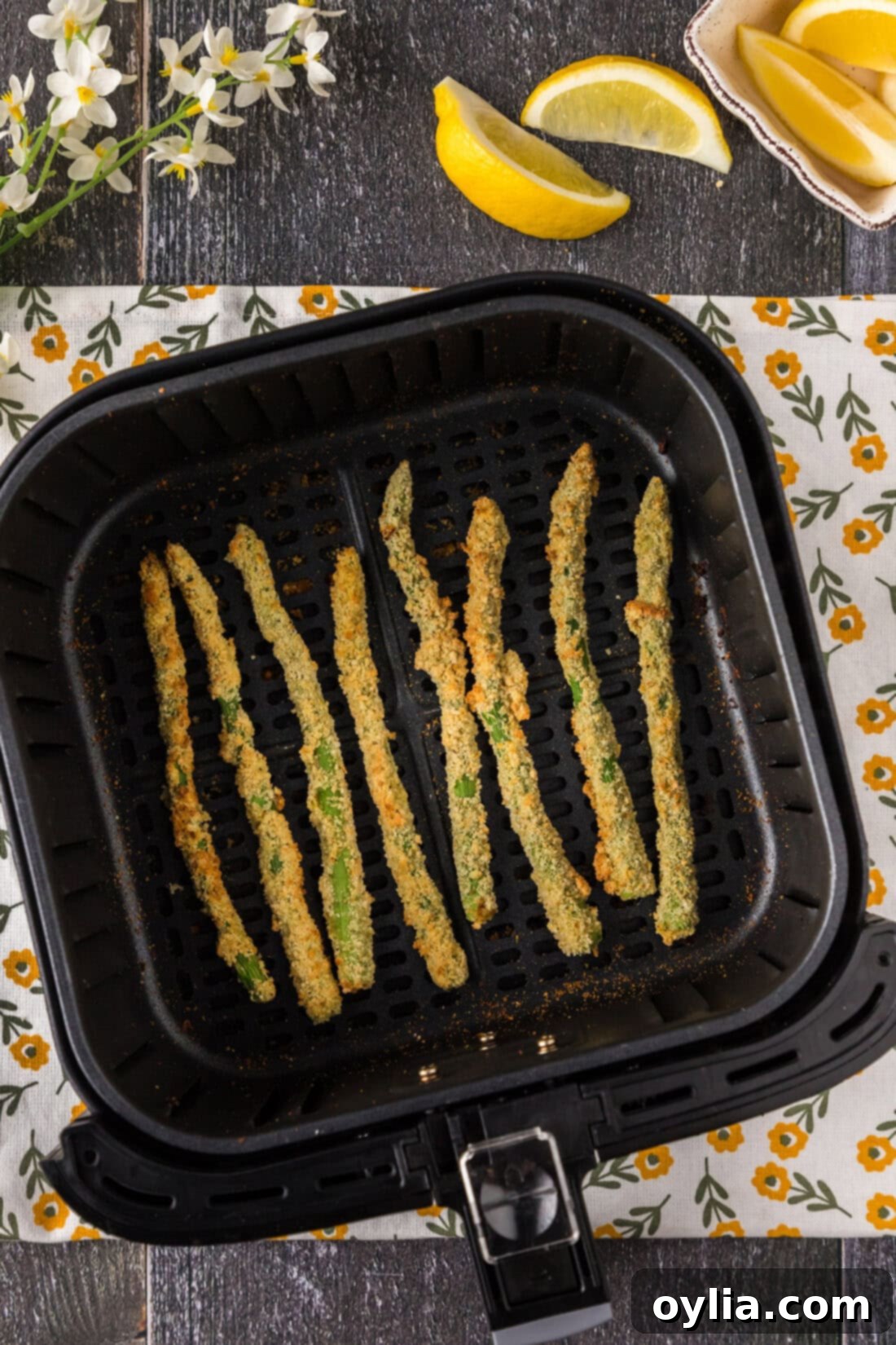 Crispy Air Fryer Asparagus 9 Air Fryer Fried Asparagus in an air fryer basket