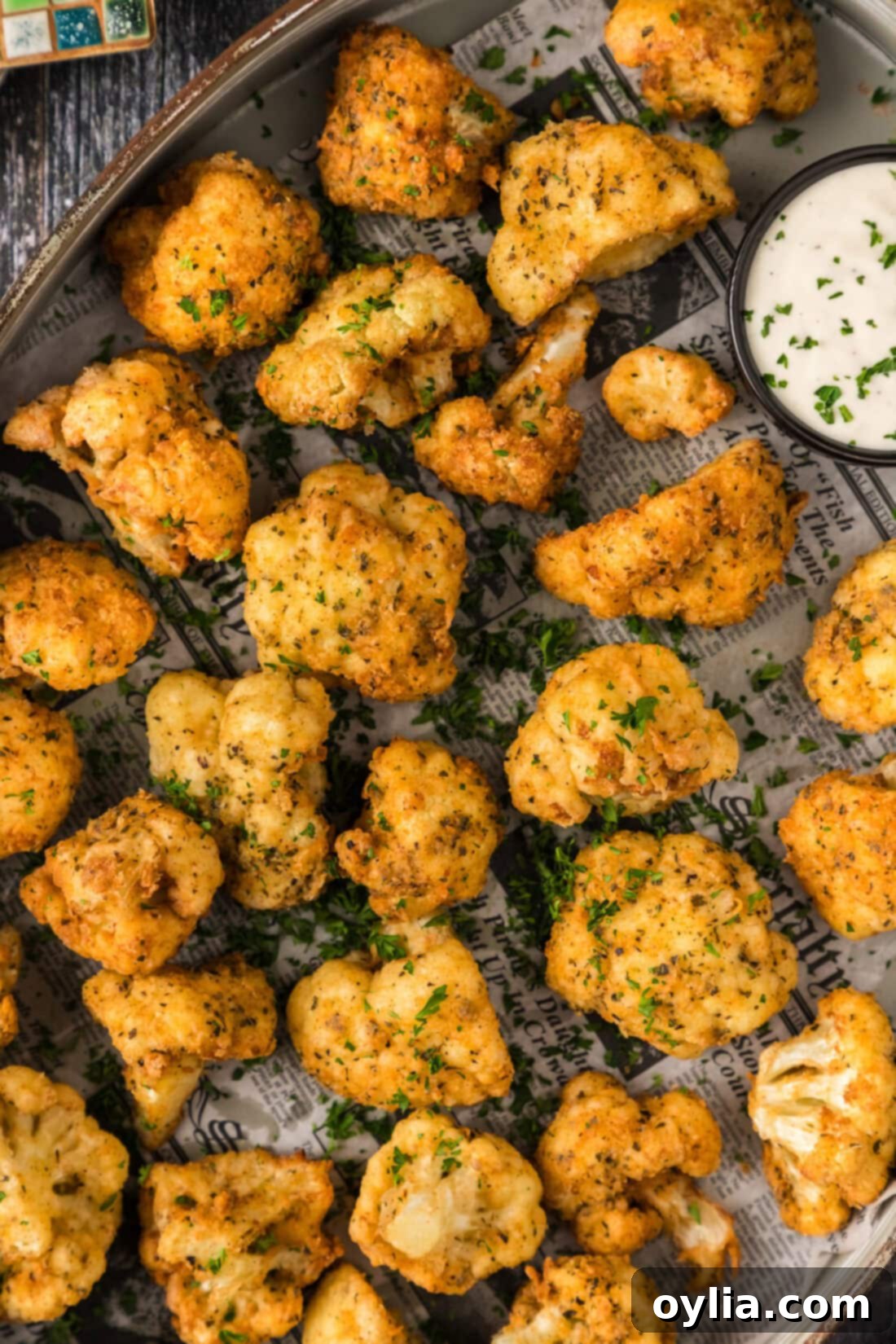 Crispy Fried Cauliflower 12 Close up overhead photo of a platter of Fried Cauliflower