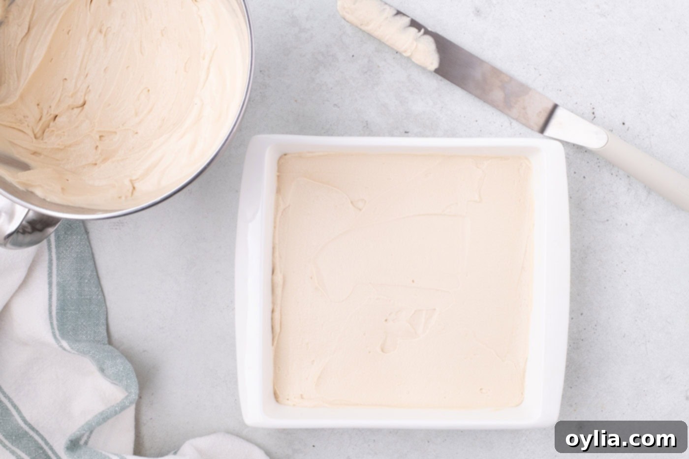 Biscoff cream cheese mixture in a baking dish