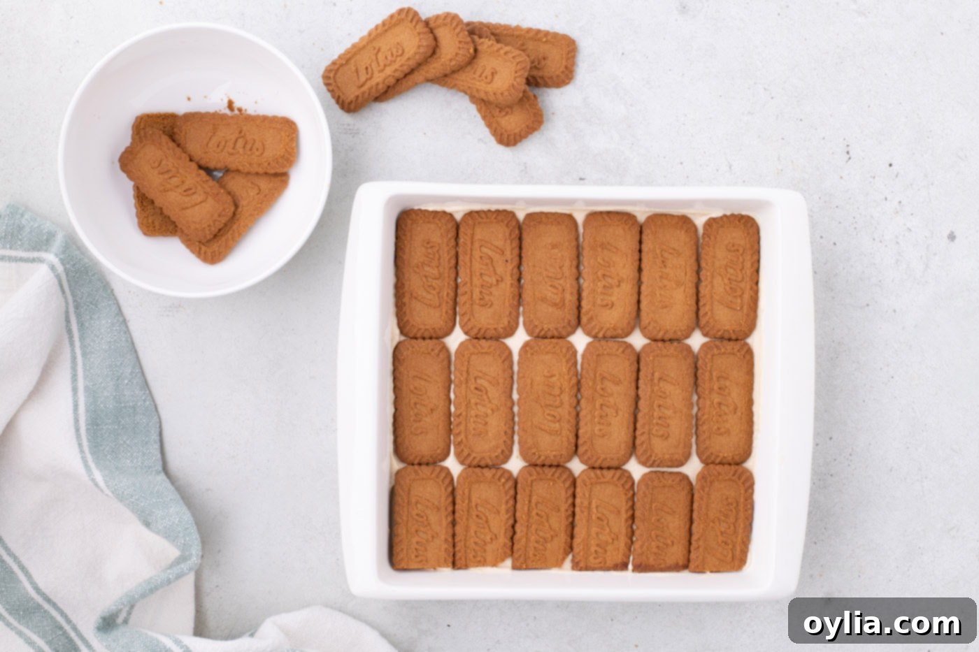 layer of Biscoff cookies over whipped cream layer