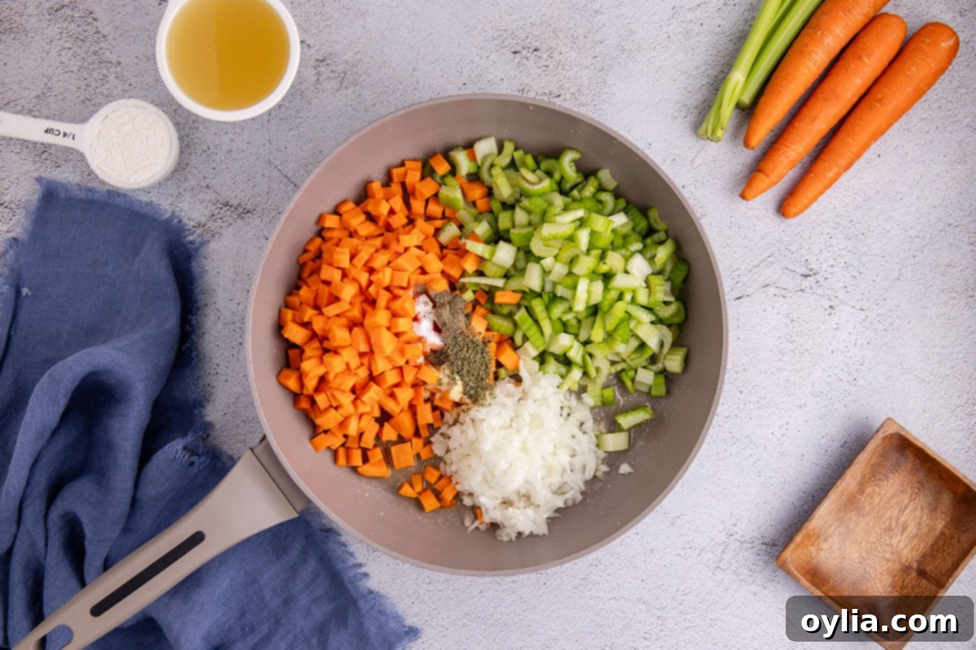 carrots, celery, and onion in a skillet