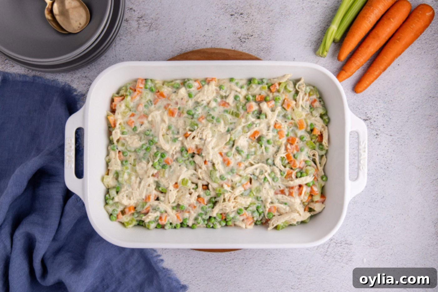 chicken pot pie filling in a casserole dish