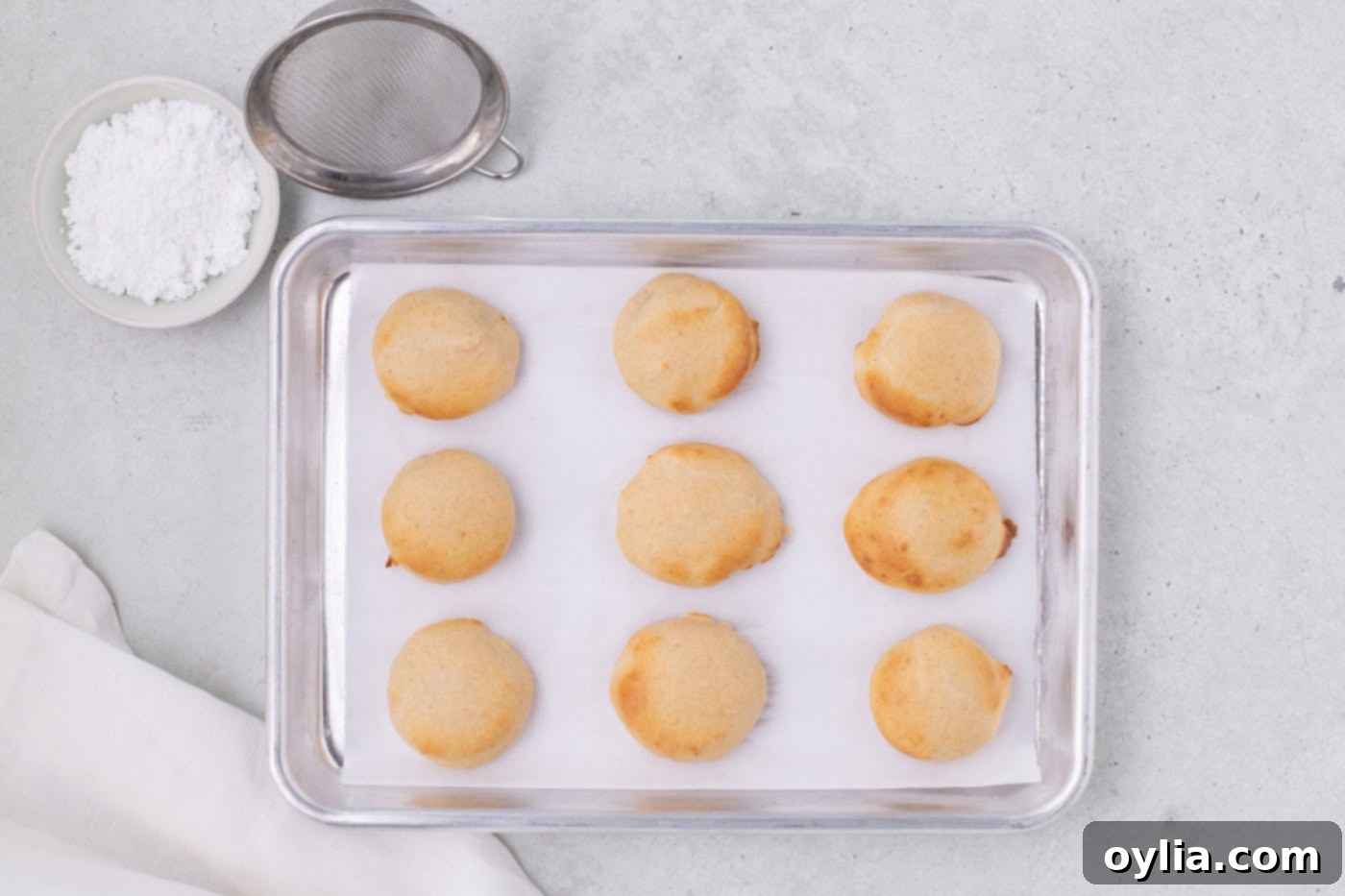 air fried Oreos on a parchment lined baking sheet