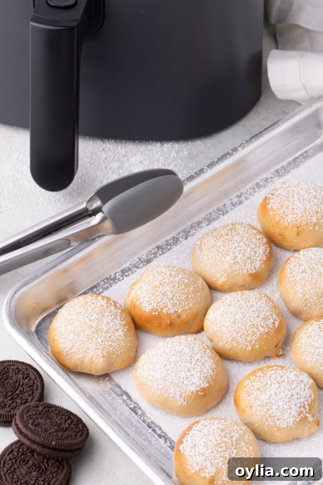 Air Fryer Oreos on a parchment lined baking sheet
