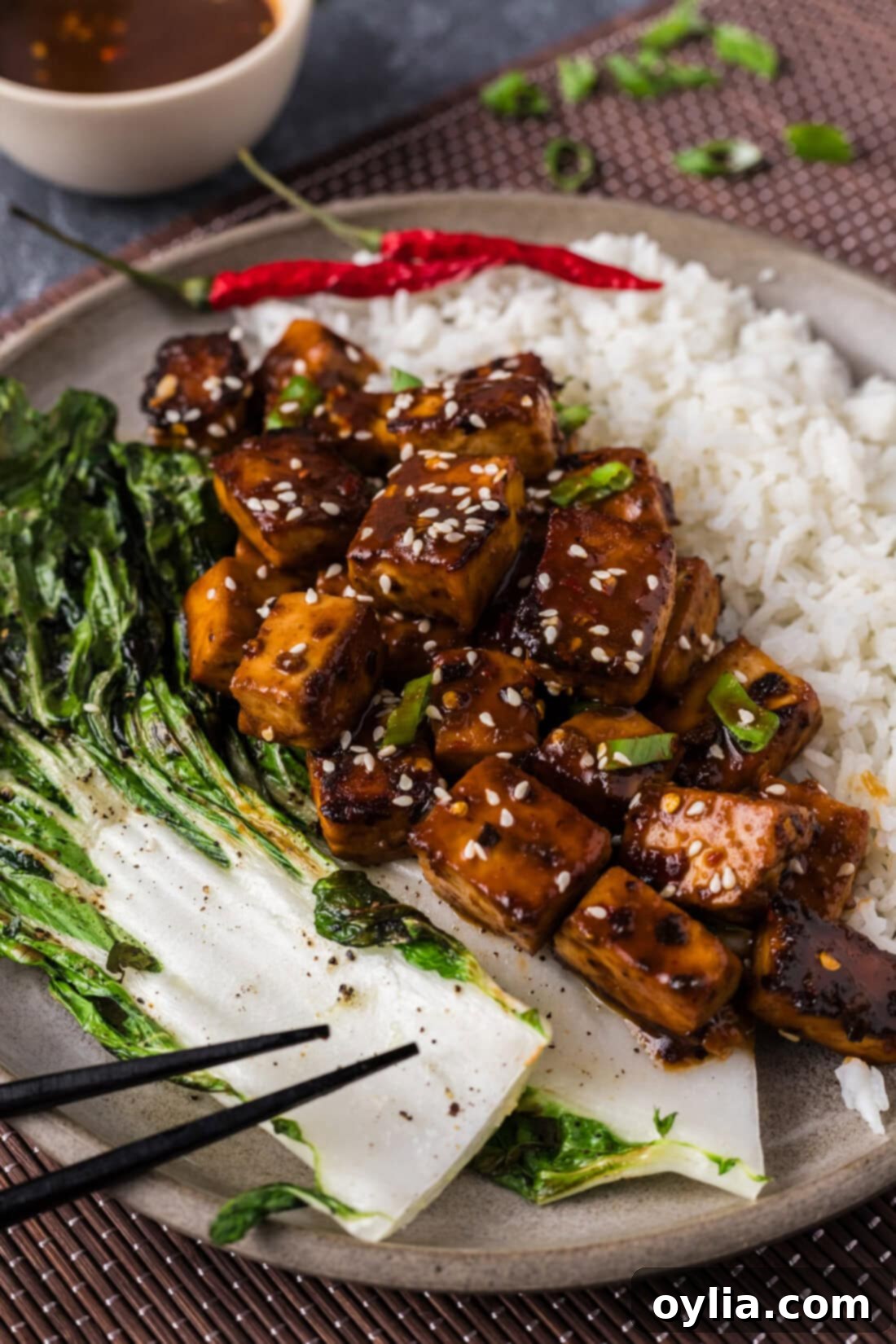 Spicy Tofu on a plate topped with sesame seeds