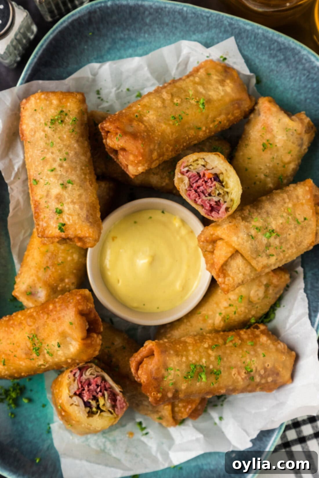 Platter of Corned Beef Egg Rolls with one cut in half