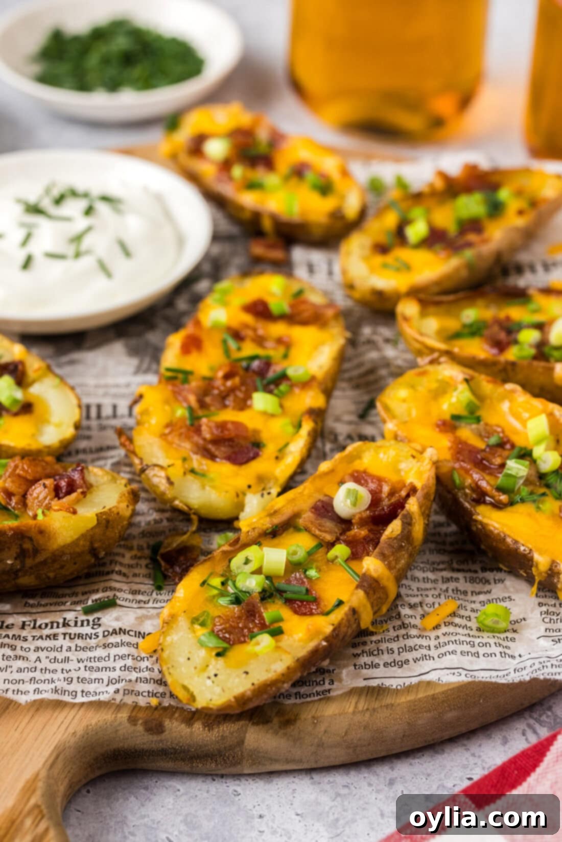 Close up photo of Potato Skins on a wooden platter