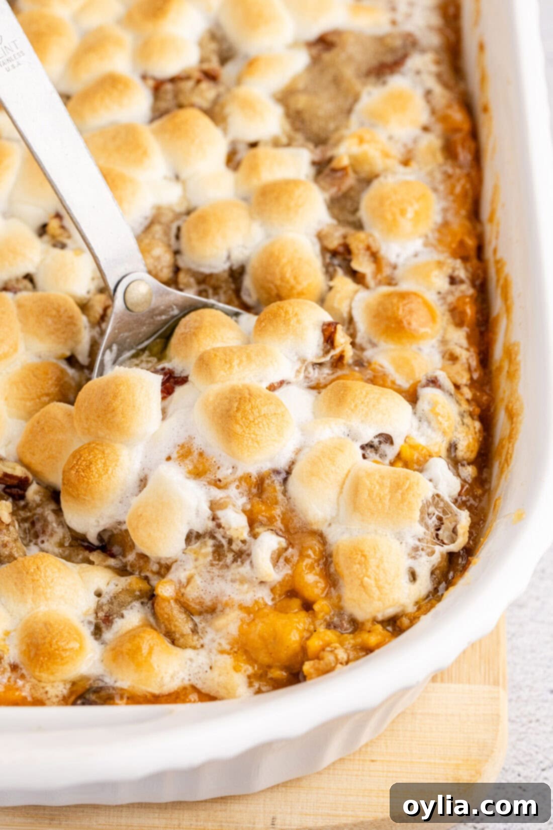 Close up photo of a spoon in Sweet Potato Casserole