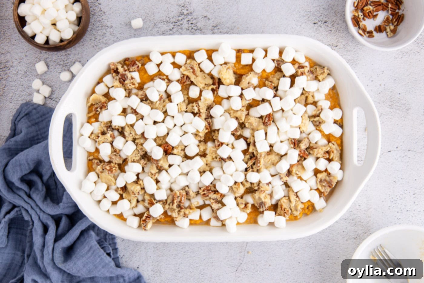 mini marshmallows layered over streusel topping and mashed sweet potatoes