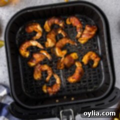 Crispy Air Fryer Bacon-Wrapped Shrimp 13 Air Fryer Bacon Wrapped Shrimp in an air fryer