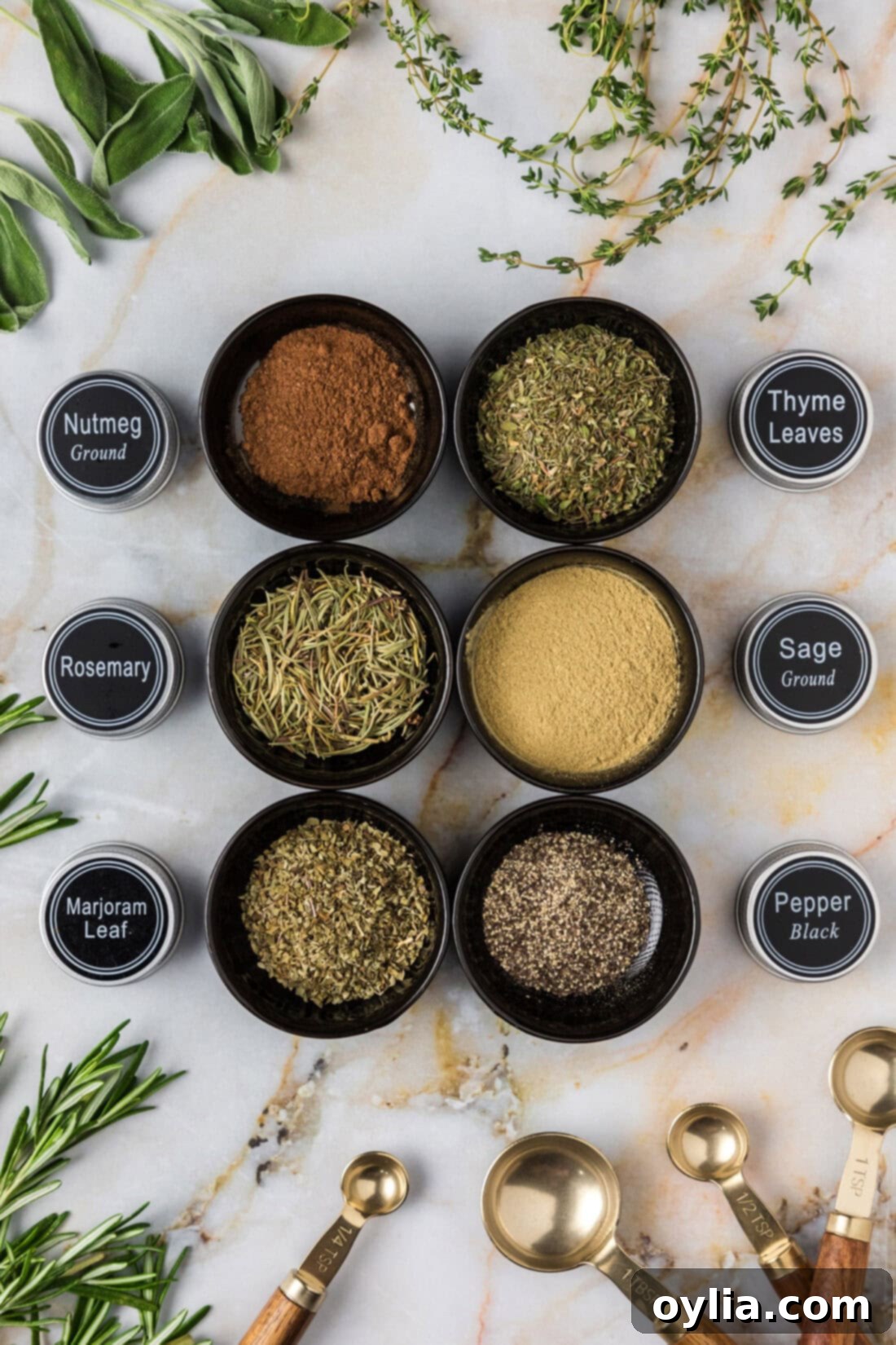 Bowls of Poultry Seasoning ingredients with the spice jar labels next to them, illustrating the individual herbs.