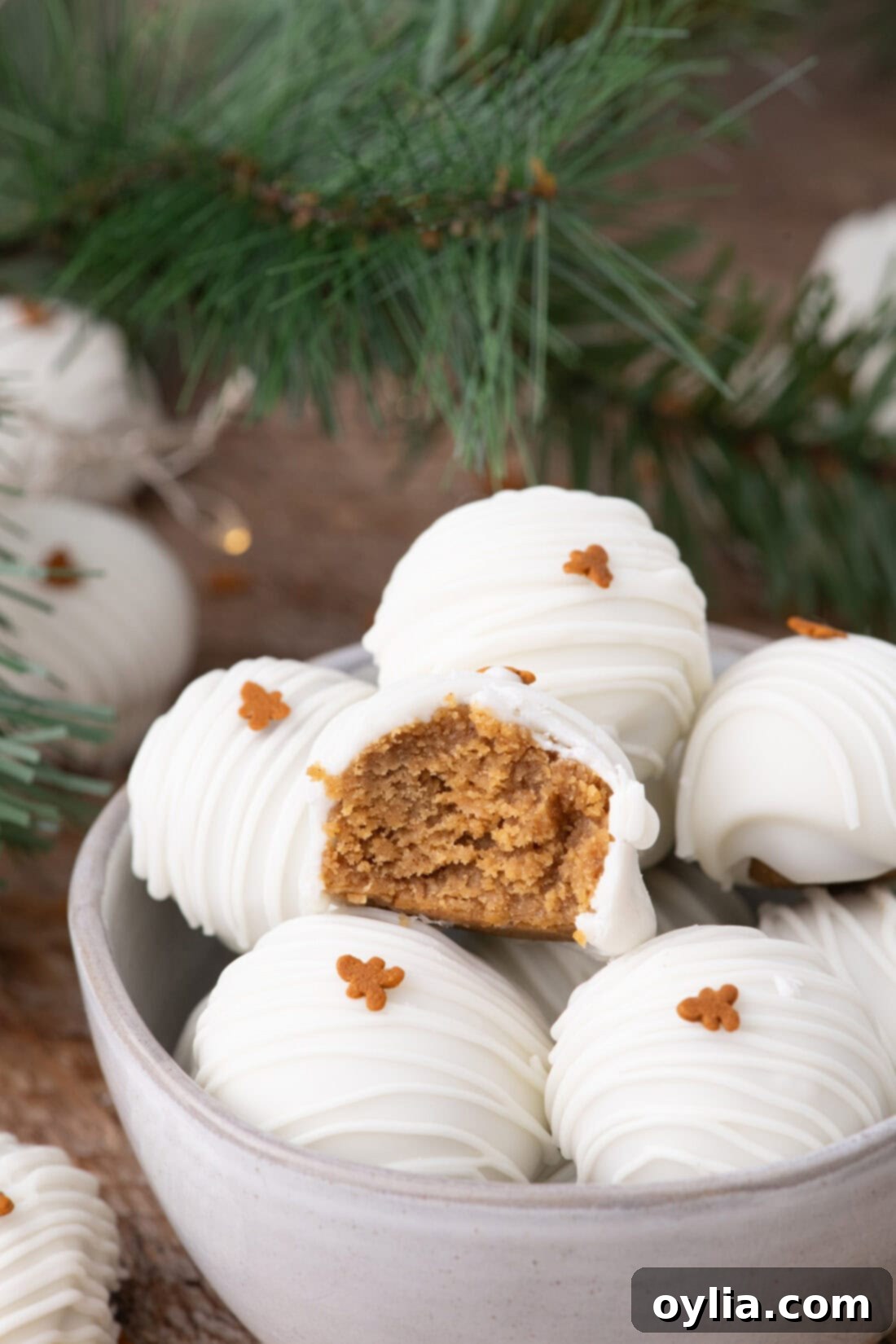 Gingerbread Dream Oreo Truffles 2 Pile of festive no-bake gingerbread Oreo truffles in a bowl for Christmas