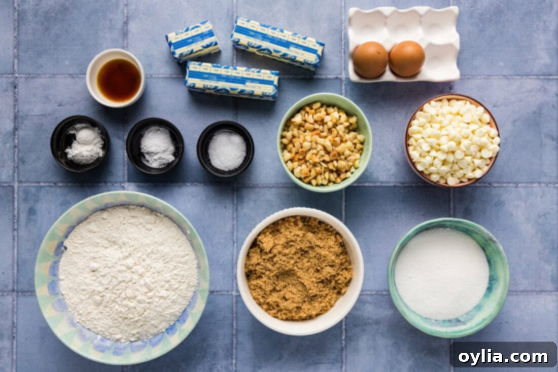 A flat lay of all the ingredients needed for White Chocolate Macadamia Nut Cookies, neatly arranged.