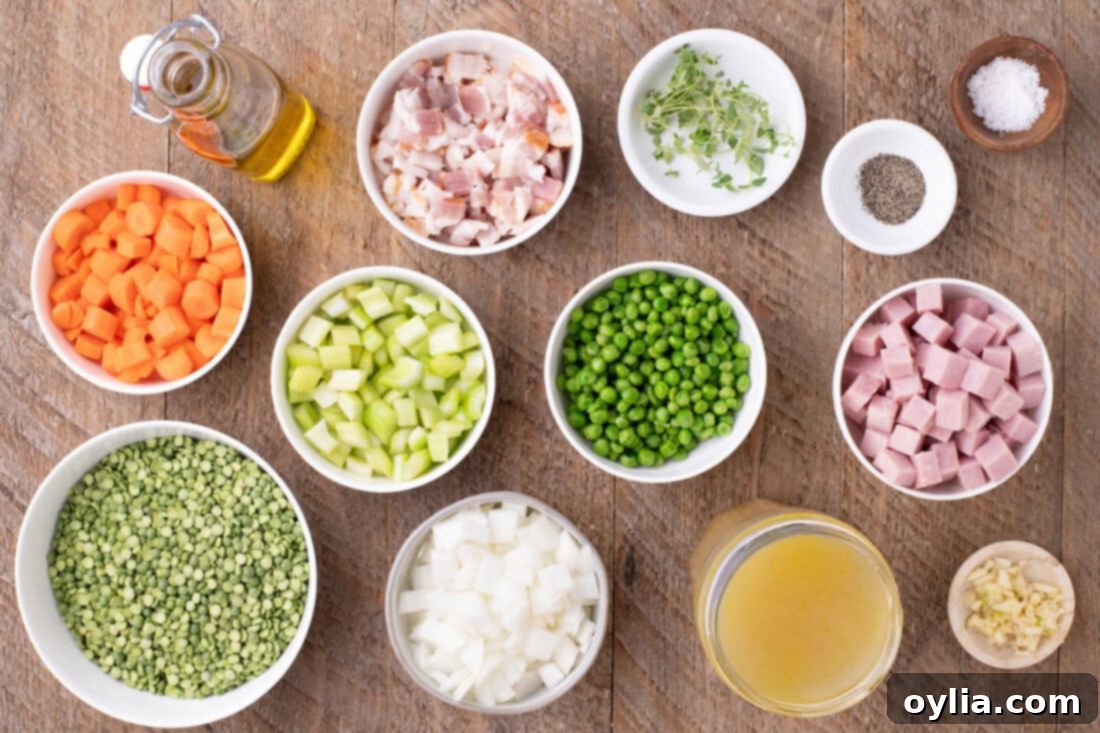 Hearty Instant Pot Split Pea Soup 4 Ingredients for Instant Pot Split Pea Soup laid out on a wooden surface, including bacon, ham, split peas, and fresh vegetables