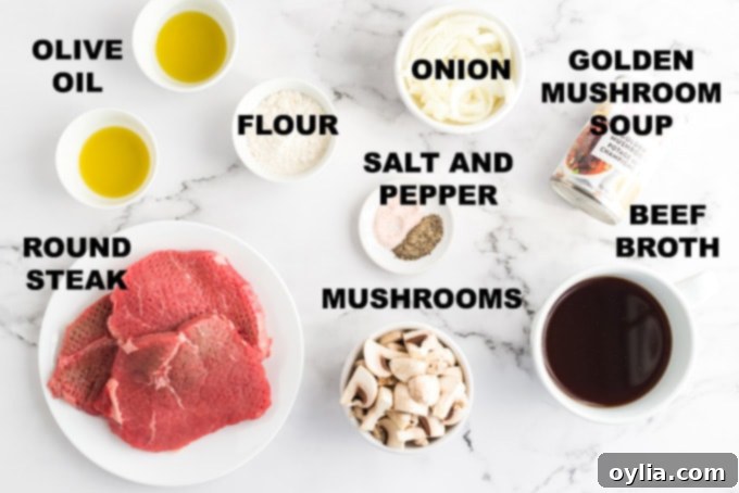 All the fresh and pantry ingredients laid out for making delicious oven Swiss steak.