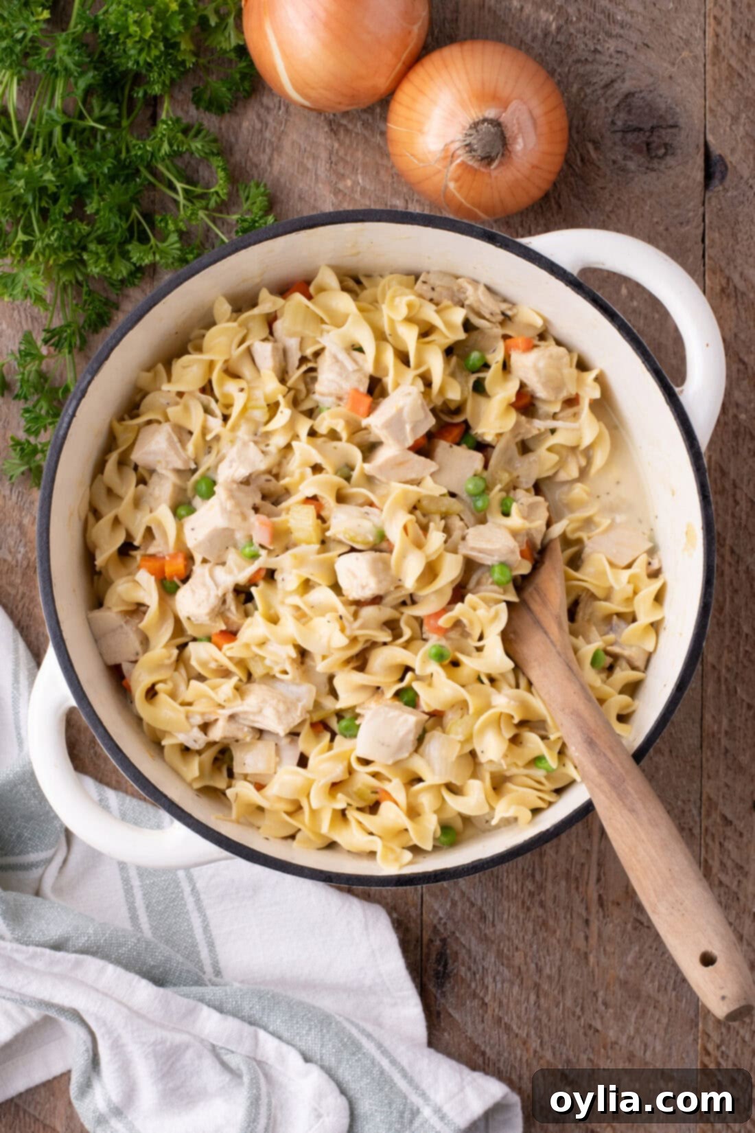 Pot of creamy One-Pot Chicken Pot Pie Pasta, ready to be served.