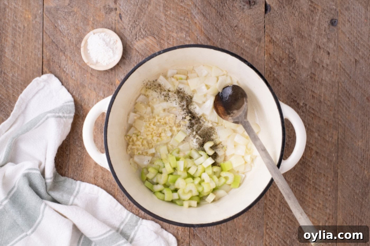 onions, celery, and garlic in a pot