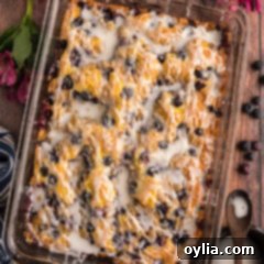 Glazed Lemon Blueberry Cake in a glass baking dish, ready to be served.