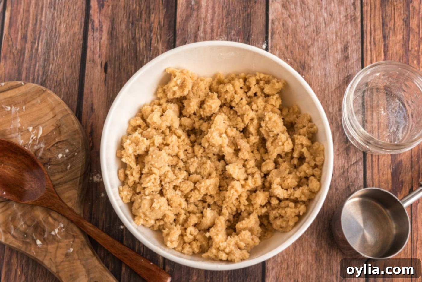 Brown sugar streusel mixture in a bowl, showing its crumbly texture.