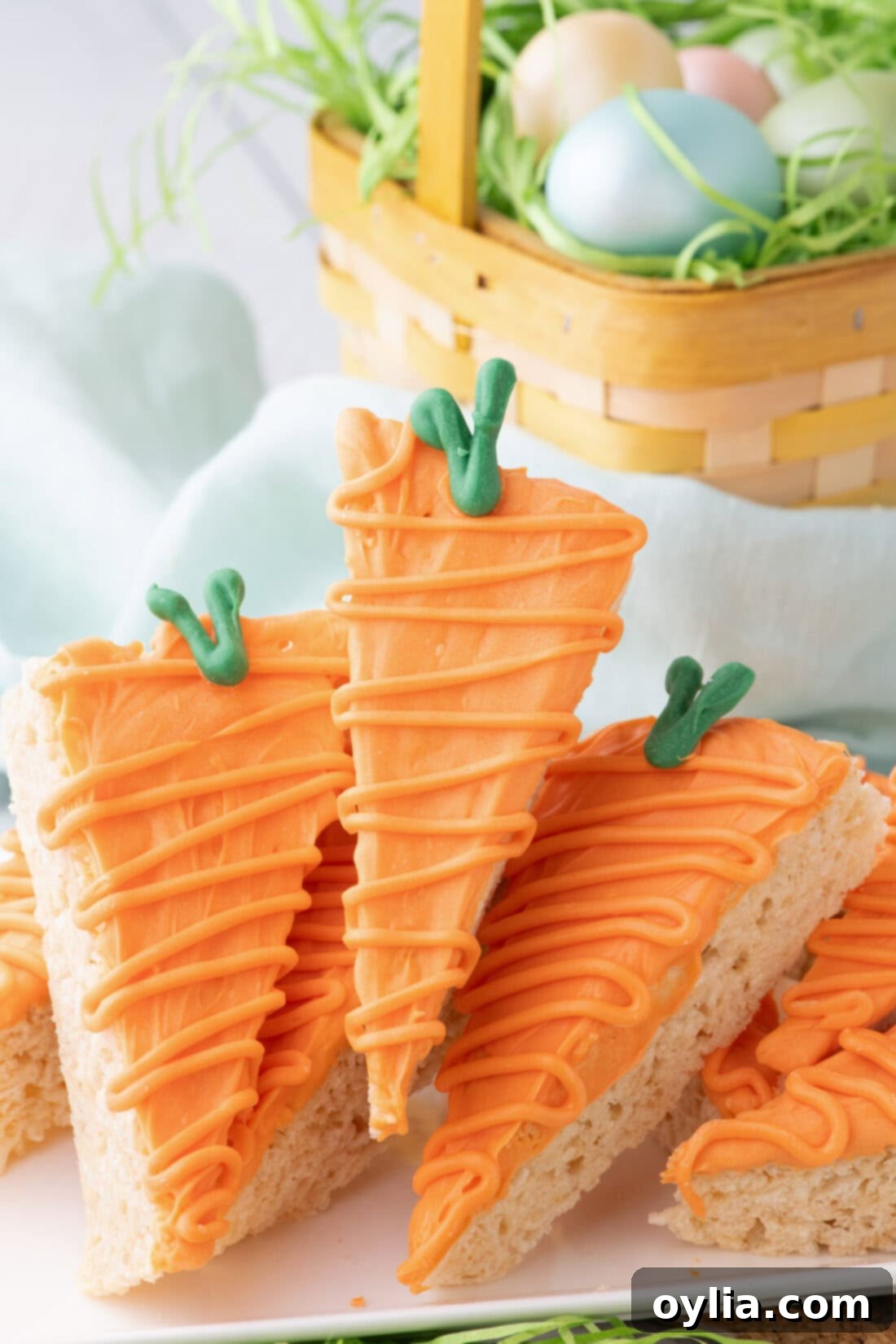 Carrot Rice Krispy Treats stacked on a platter