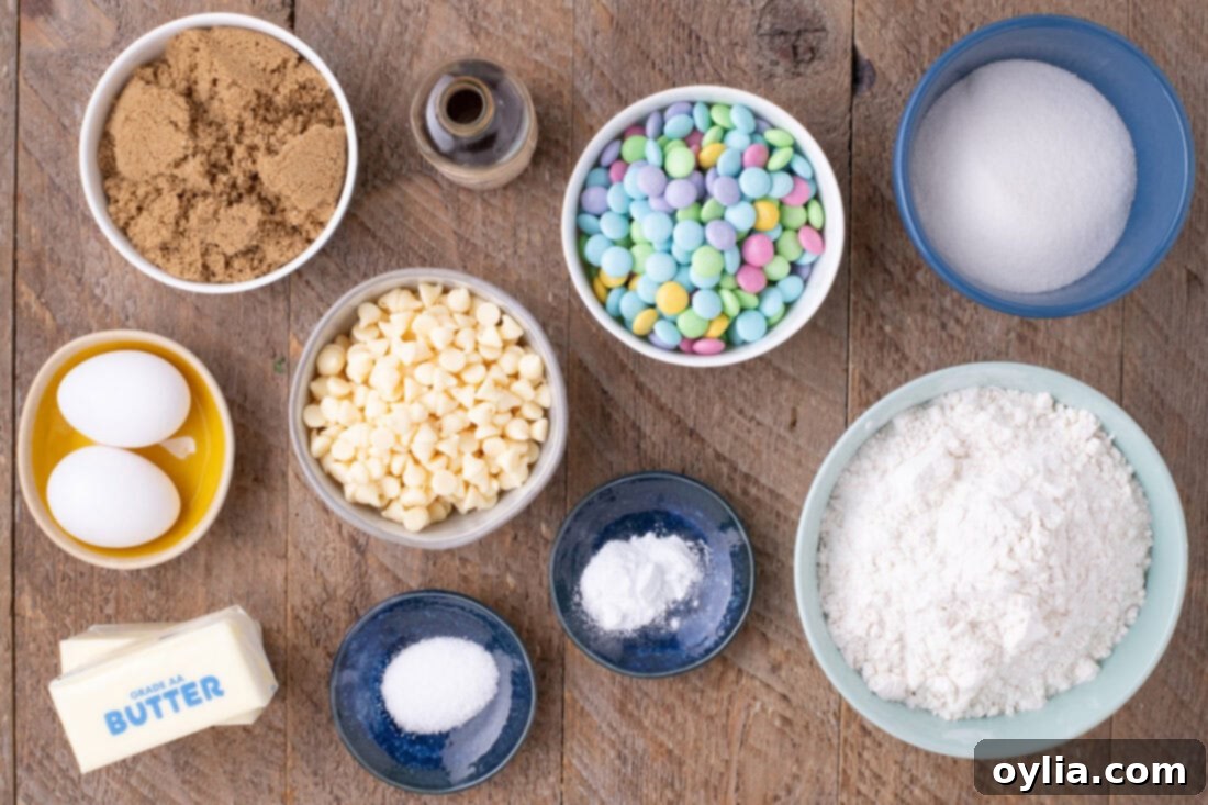 A collection of ingredients laid out on a table, ready for making Easter M&M Cookies.