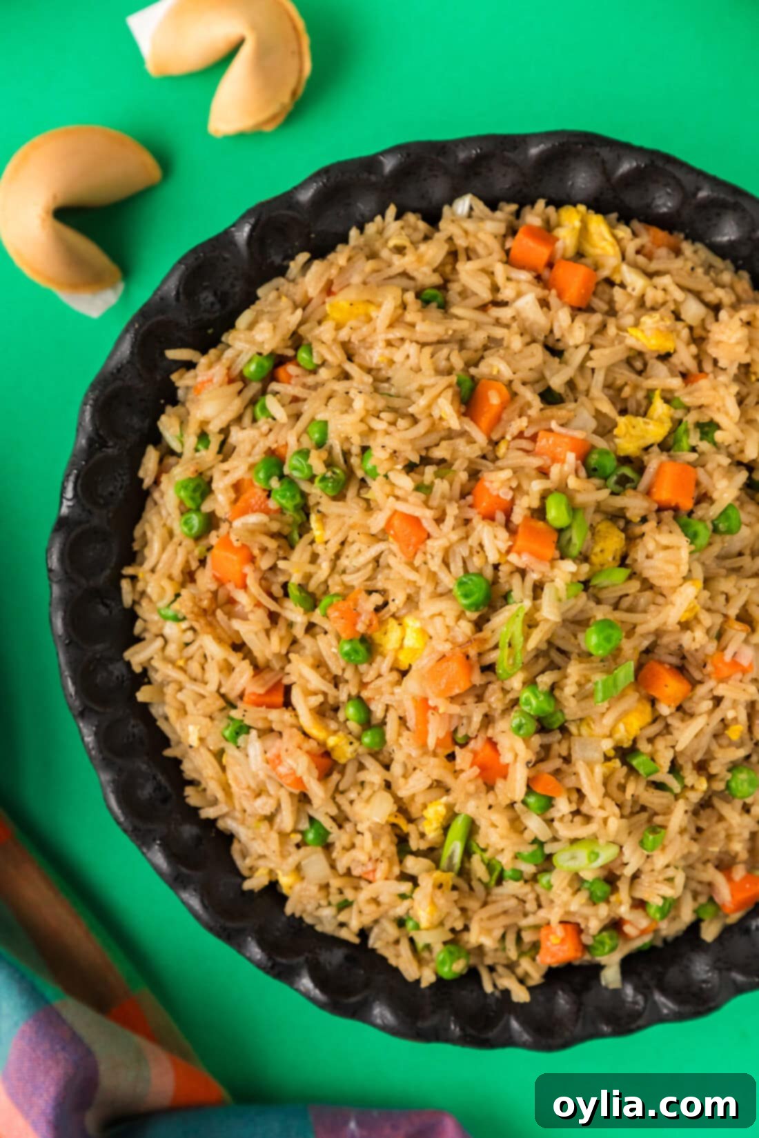 The Secret to Perfect Fried Rice 2 Half a bowl of Fried Rice with fortune cookies to the side