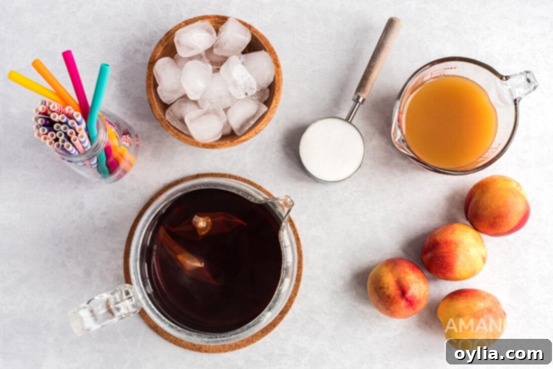 Ingredients laid out for Olive Garden style peach iced tea: cold brew tea bags, granulated sugar, and peach nectar