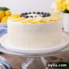 Lemon Poppy Seed Cake on a cake stand