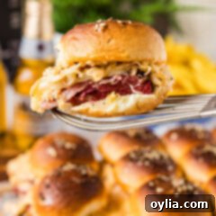 Delicious Reuben Sliders in a square format, ready for a party