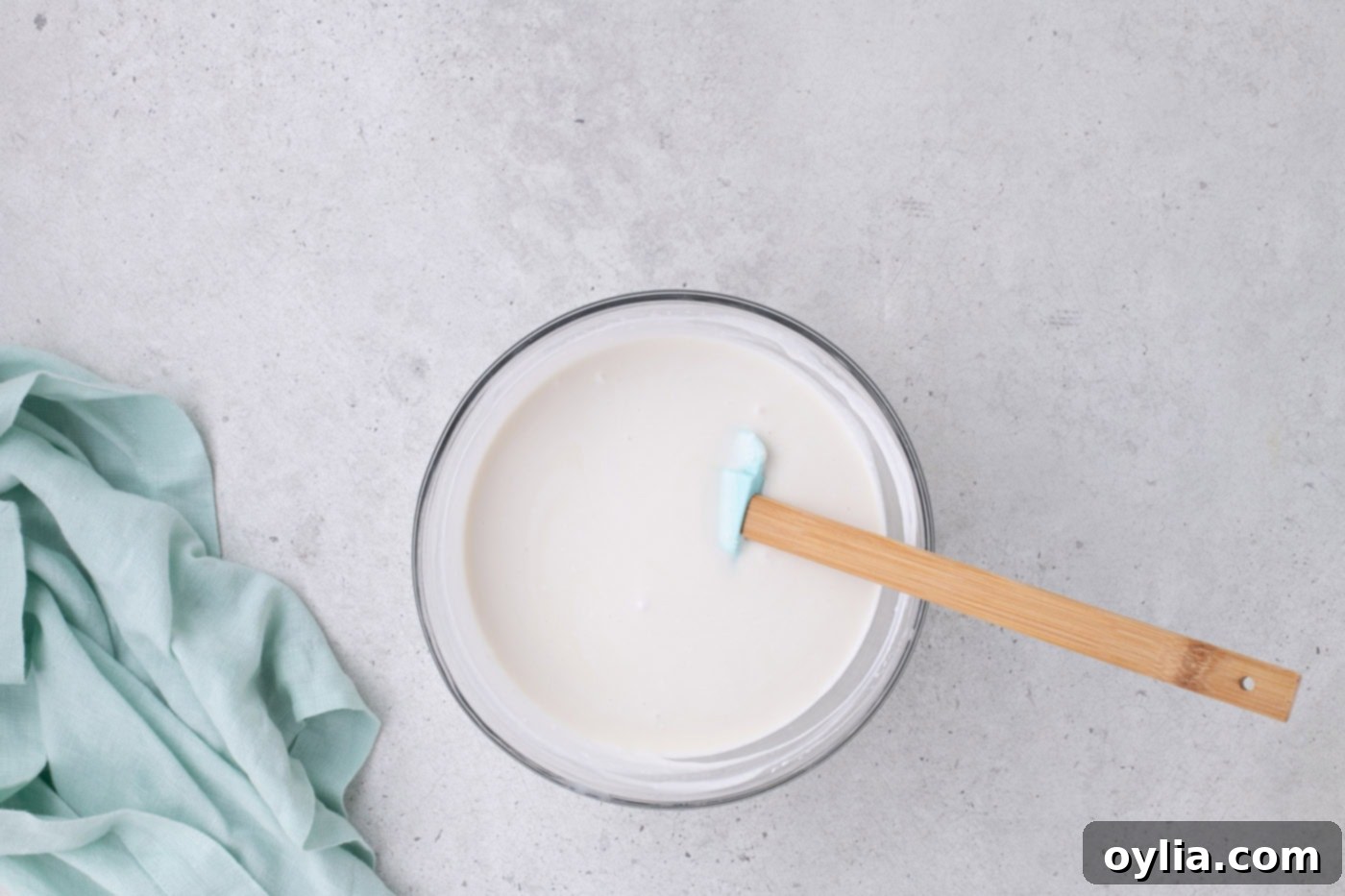 coconut cream and sweetened condensed milk in a bowl