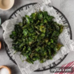 Crispy Air Fryer Spinach on parchment paper