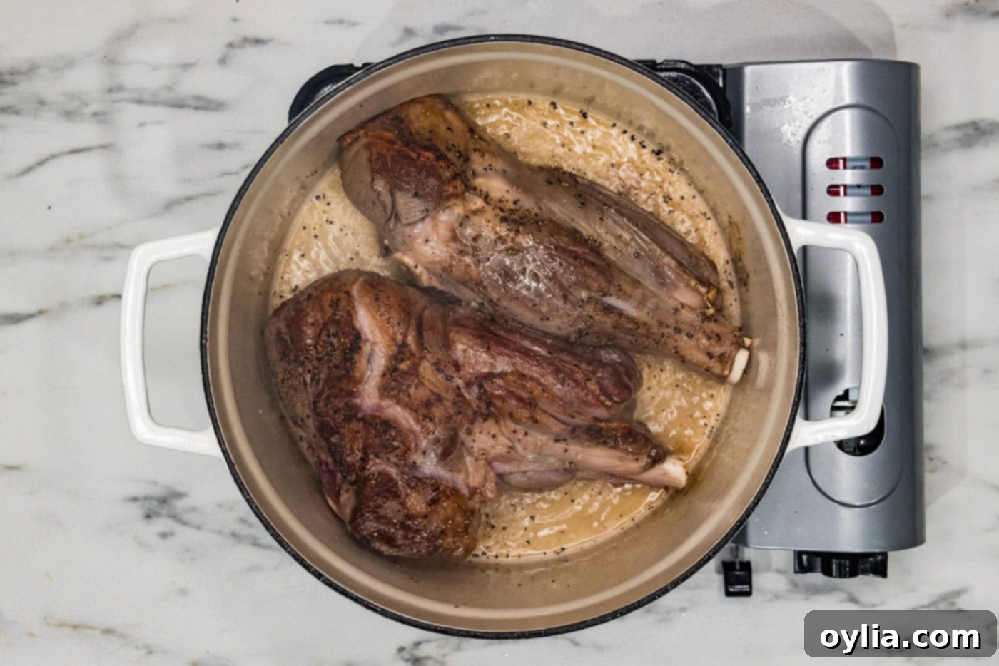 searing lamb shanks in a dutch oven with oil