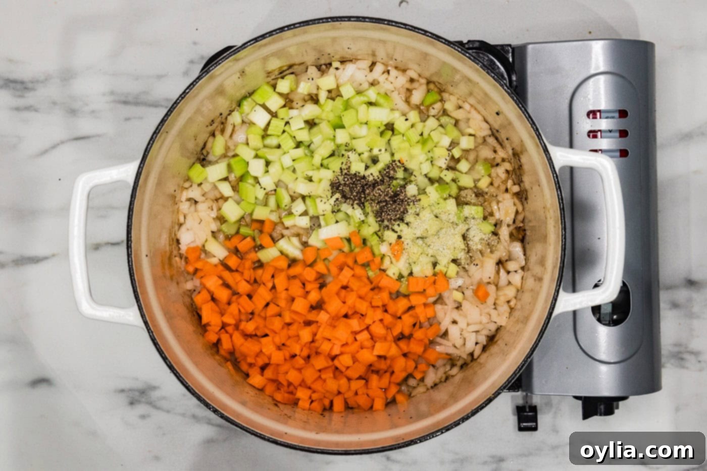 carrots, onions, and celery in a dutch oven