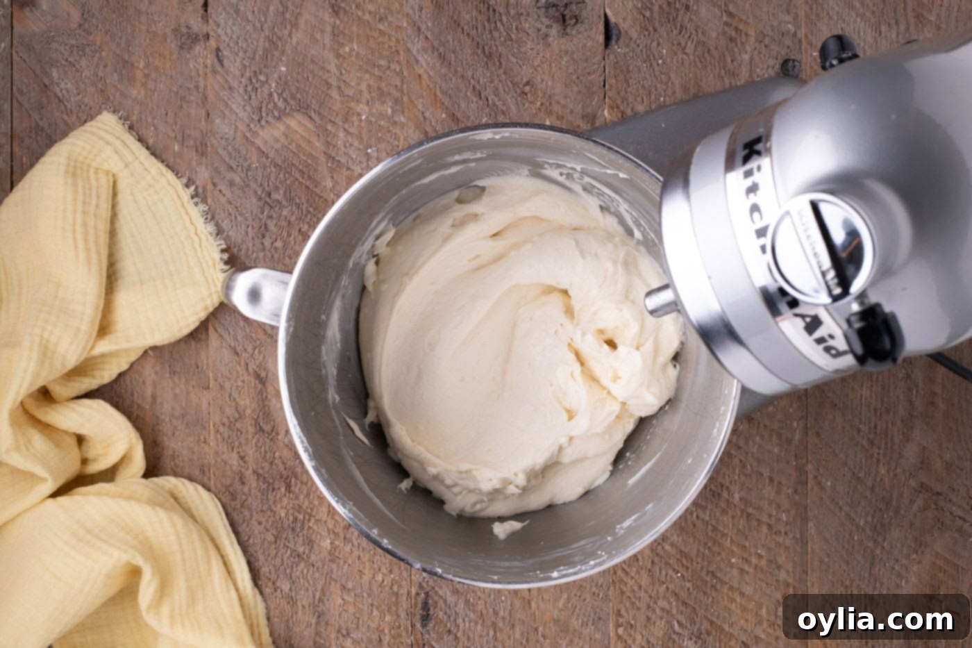 cream cheese frosting in a stand mixer bowl