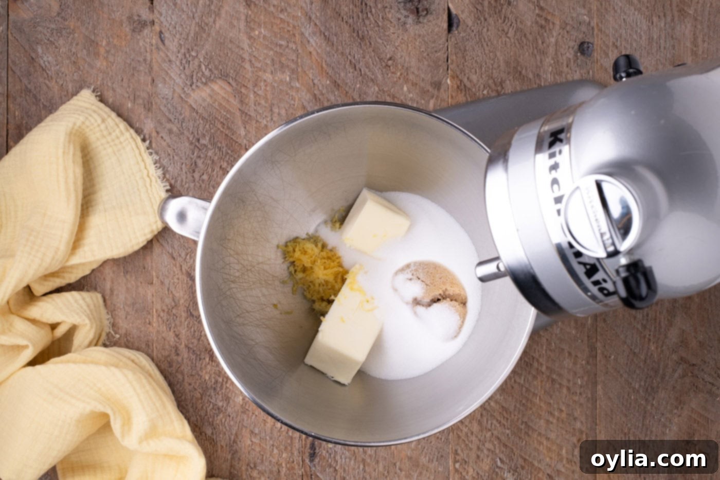 butter and sugars in a bowl of a stand mixer